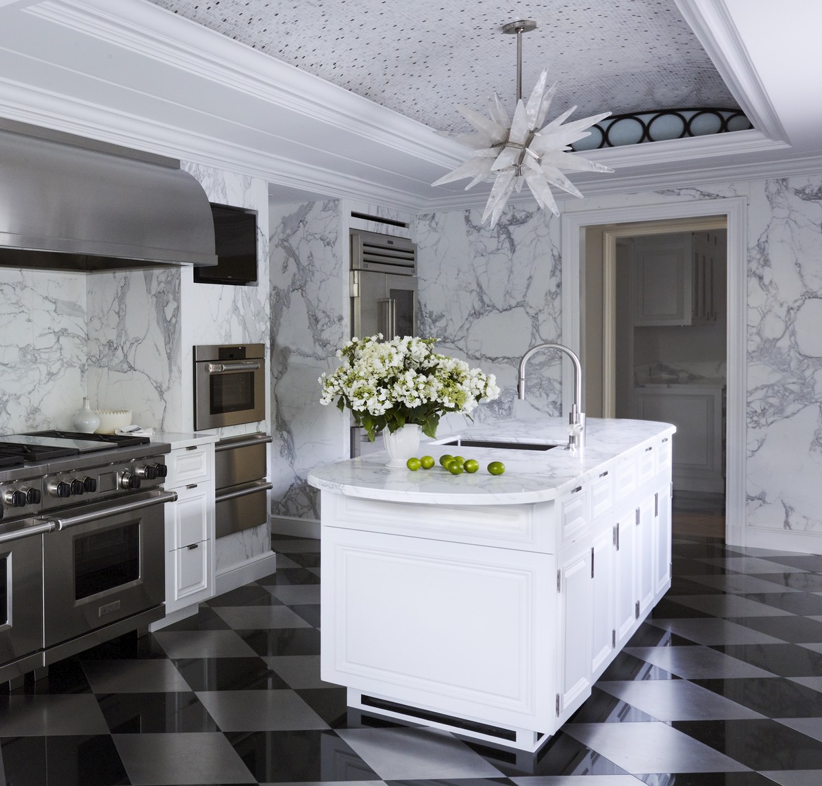 Kitchen of 1938 Ann Rutherford house in Beverly Hills with Calacatta marble walls